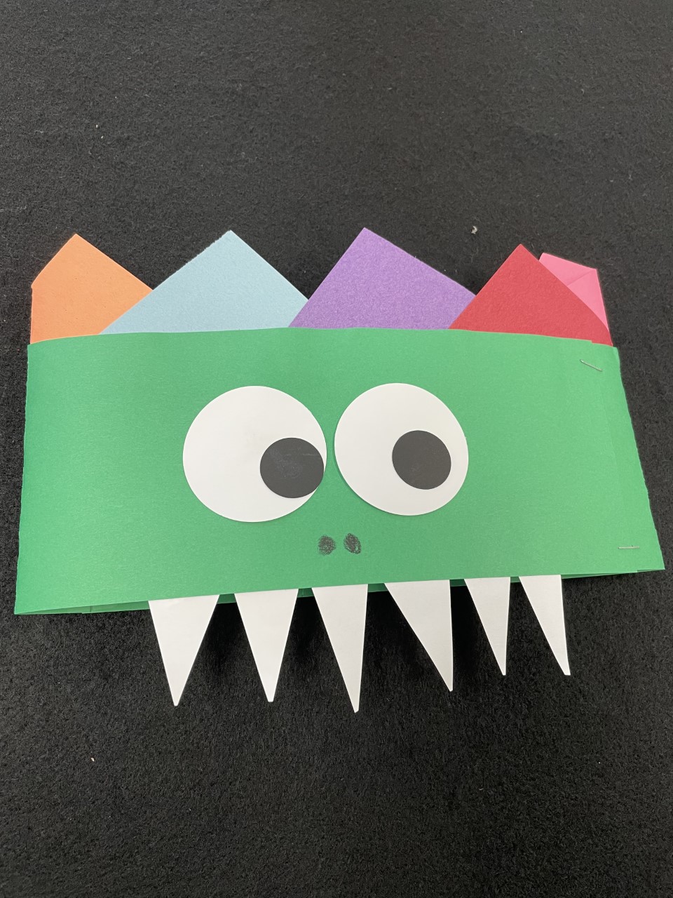 dinosaur headband with teeth and spikes