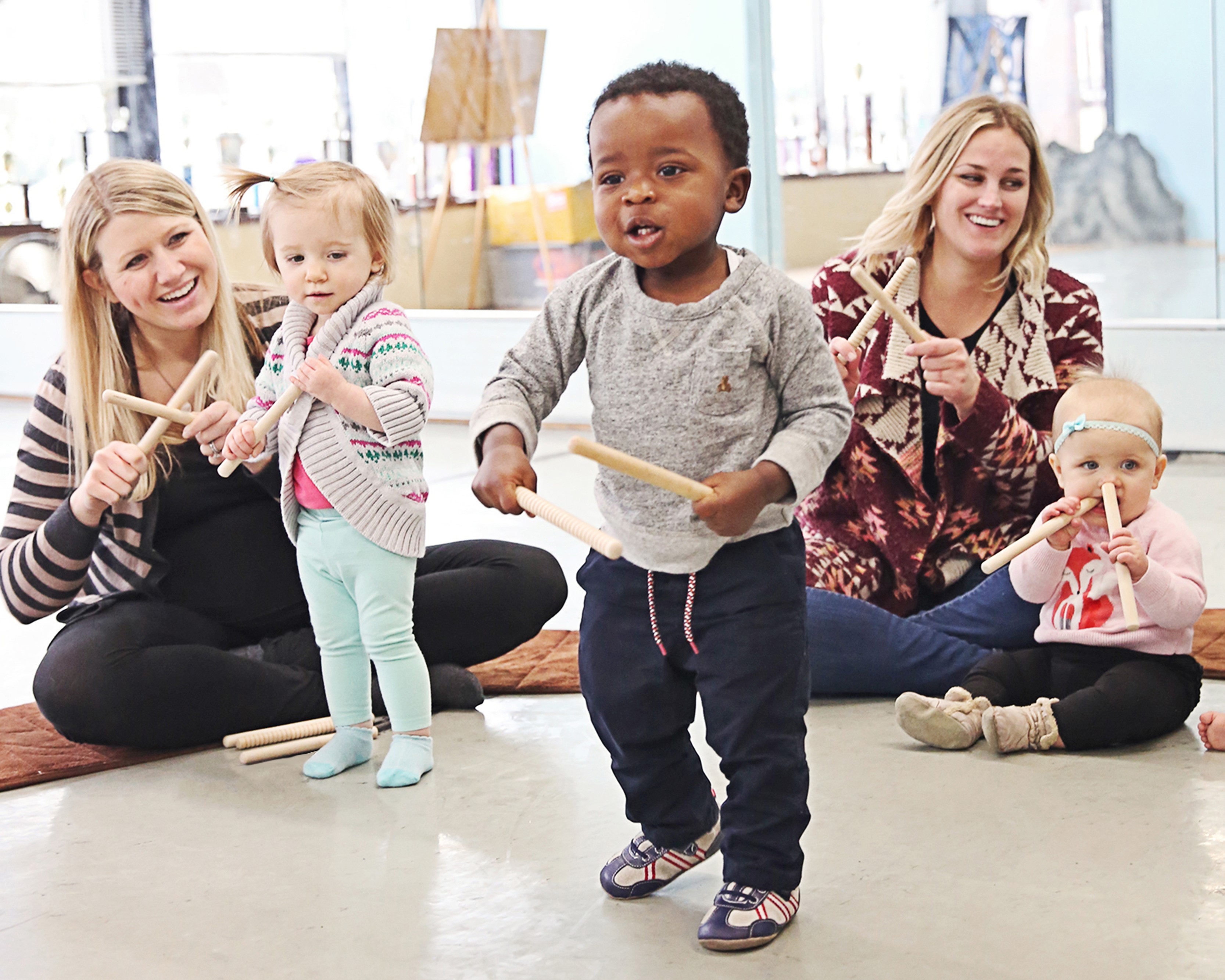 children playing music together