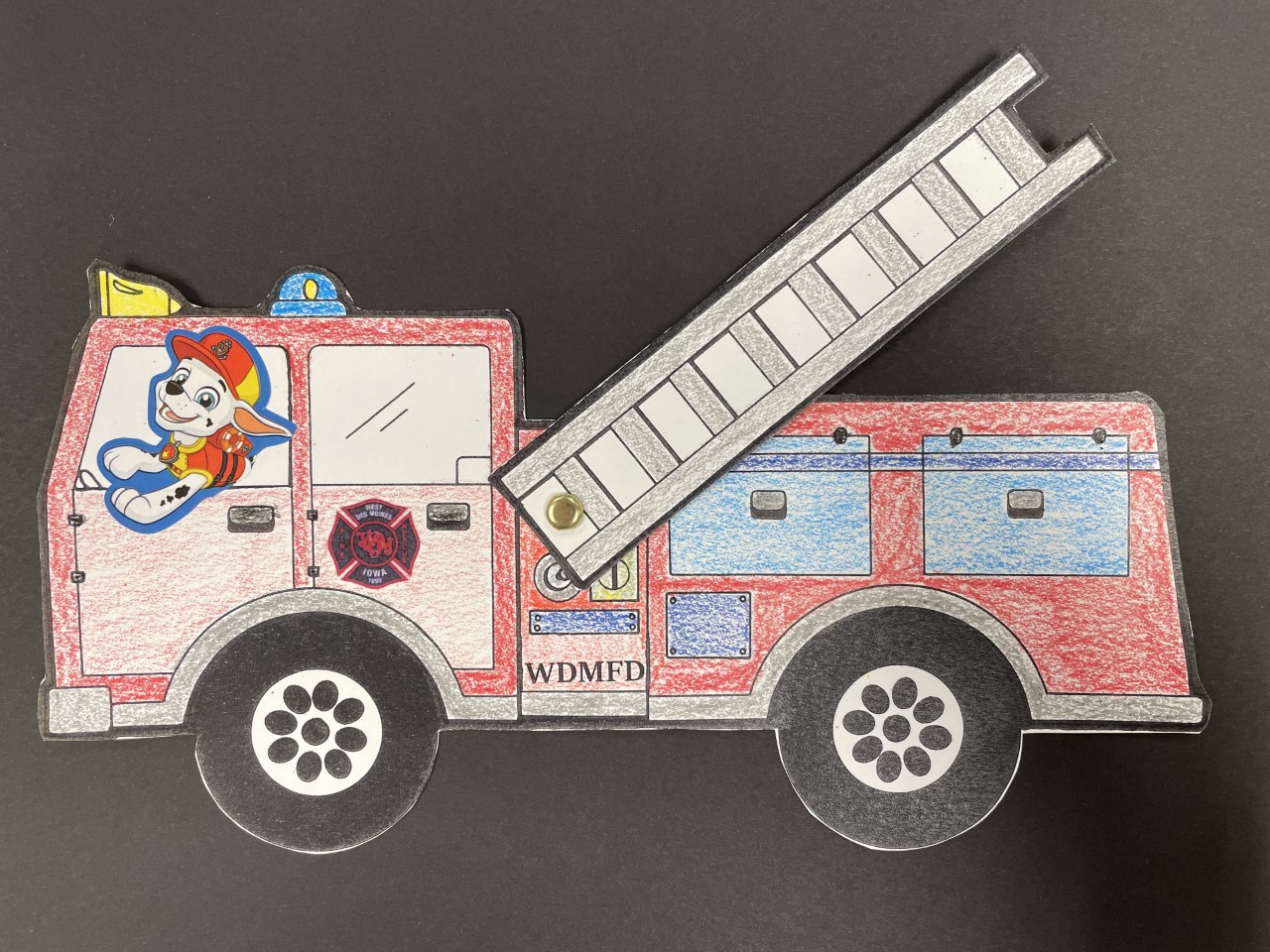 colored firetruck with ladder