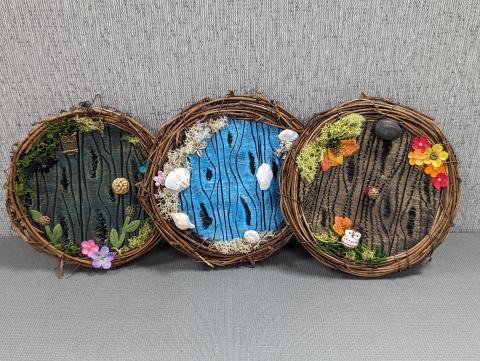Three foam circular doors, surrounded by grapevine wreaths