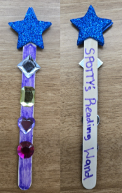 Photo of a reading pointer that looks like a magic wand craft. One side has plastic jewel stickers on it, the other side has purple text that reads "Spotty's Reading Wand".