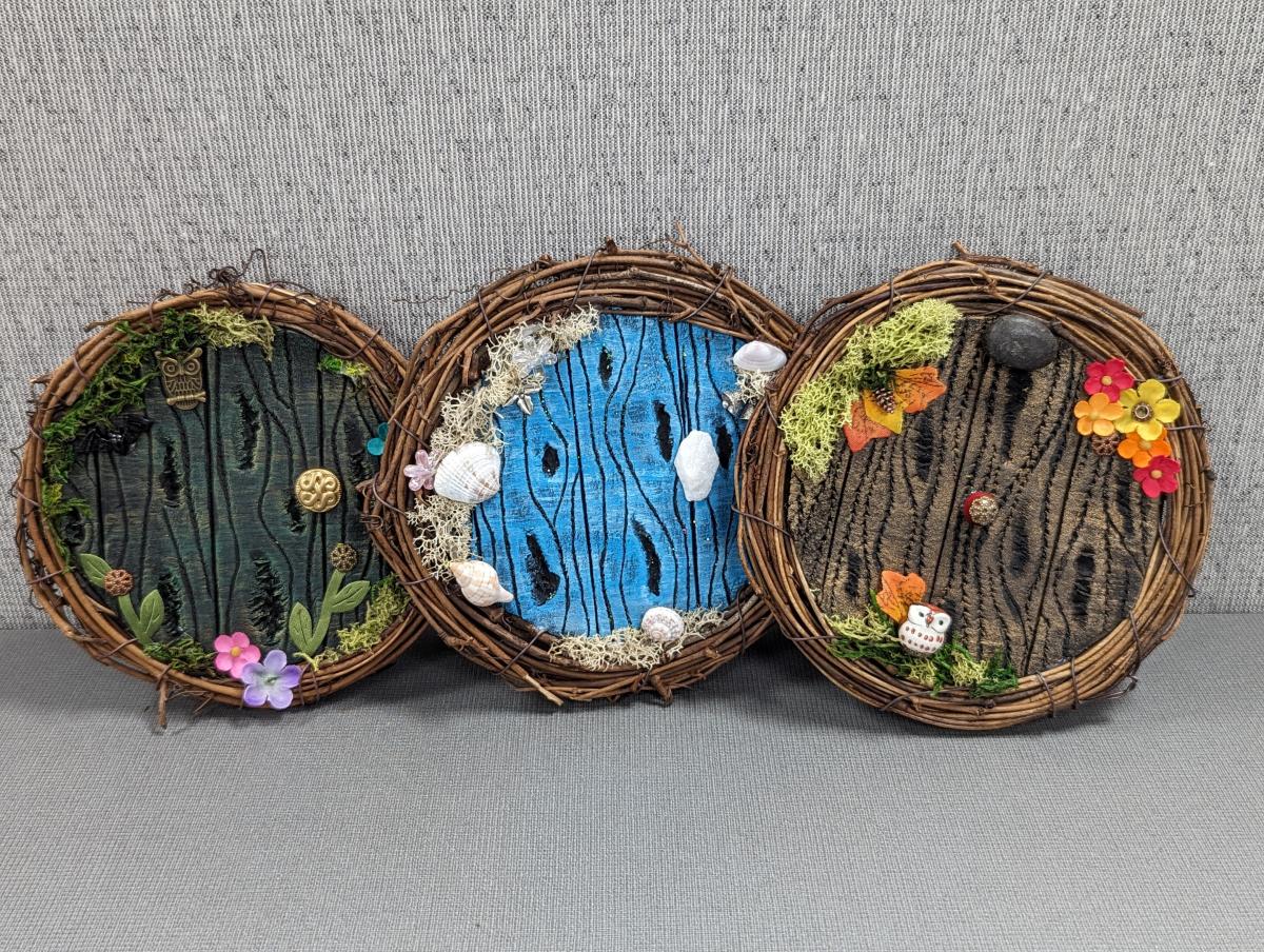 Three foam circular doors, surrounded by grapevine wreaths