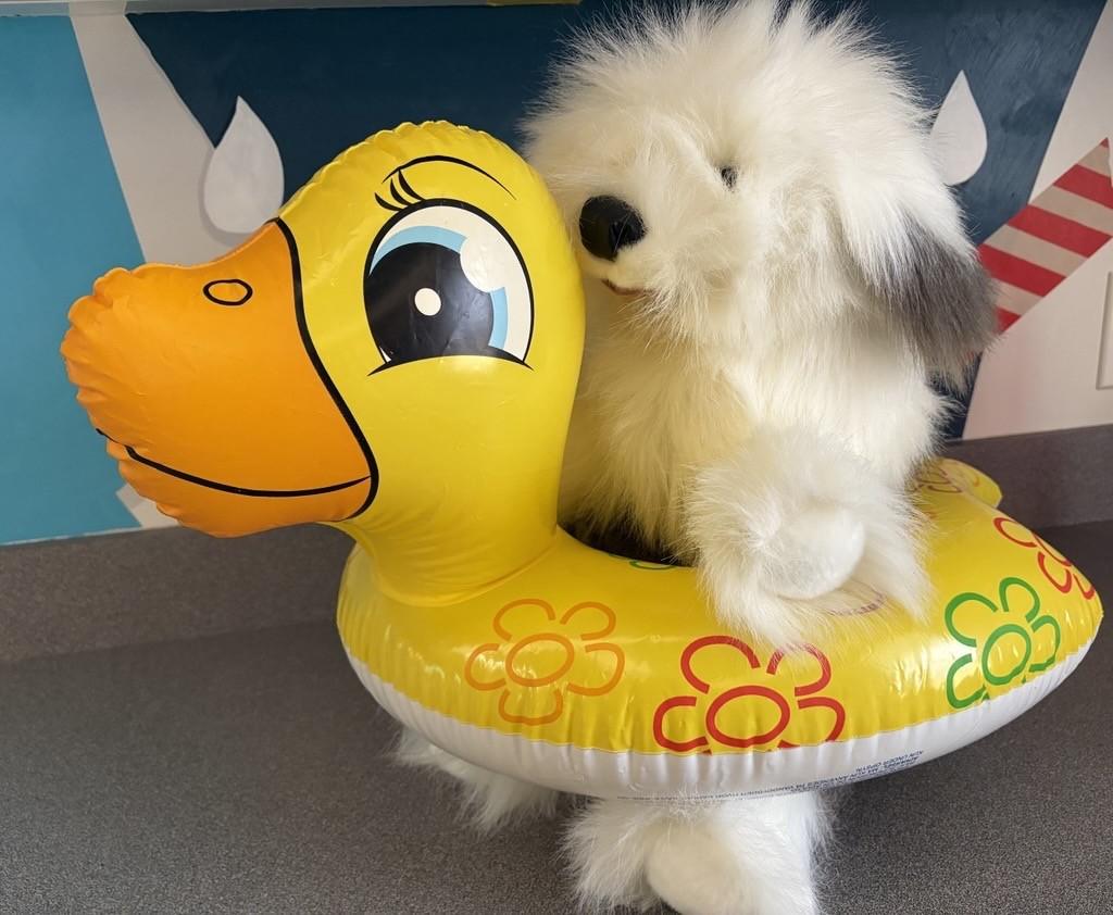 puppet dog with duck floatie